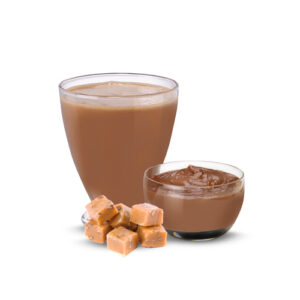 A glass of chocolate milk and some caramel.