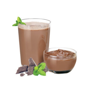 A glass of chocolate milk and bowl of chocolate.
